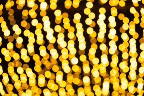 Festive Golden Light Dots Pattern for Holiday Design. Stock Photos