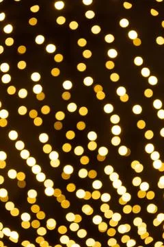 Festive Golden Light Dots Pattern for Holiday Design. Stock Photos