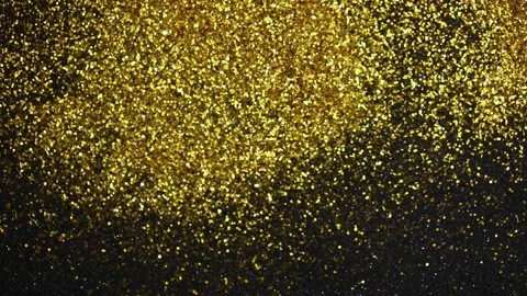 Festive golden sequins pouring down on a black background Stock-Footage 221213189