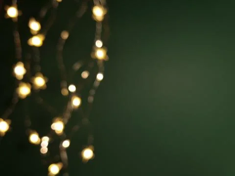 Festive green background with lights Stock Photos