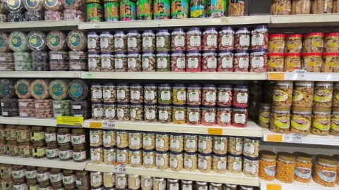 Festive Hari Raya Cookies in Sturdy Jars at a Malaysian Supermarket Stock Footage 334707740
