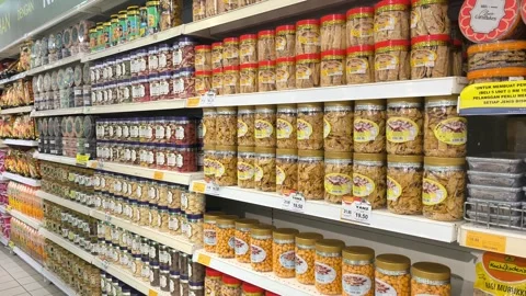 Festive Hari Raya Cookies in Sturdy Jars at a Malaysian Supermarket Stock Footage 334722386