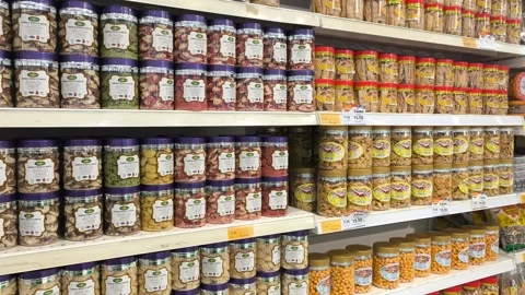 Festive Hari Raya Cookies in Sturdy Jars at a Malaysian Supermarket Stock Footage 334776774
