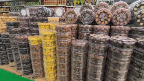Festive Hari Raya Cookies in Sturdy Jars at a Malaysian Supermarket Stock Footage 334776946