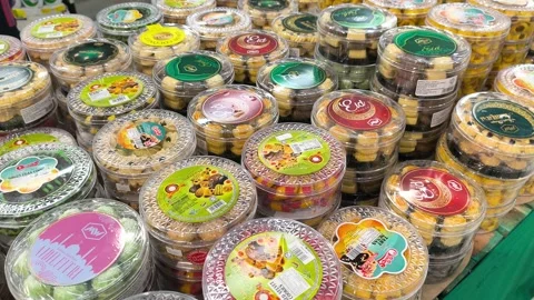 Festive Hari Raya Cookies in Sturdy Jars at a Malaysian Supermarket Stock Footage 334777623