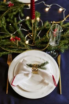 Festive Holiday Dinner Table Setting with Elegant Christmas Decor Stock Photos