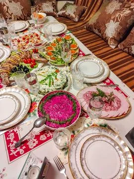Festive home dinner table with caviar and shrimp elegant table setting vert.. Stock-Fotos