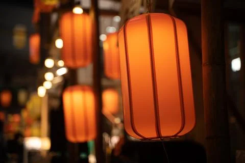 Festive lanterns hang high. Stock Photos