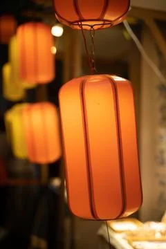 Festive lanterns hang high. Stock Photos