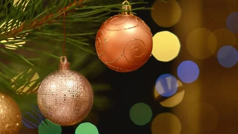 Festive Looping Video Featuring Golden Bauble on Pine Branches Stockbeeldmateriaal 344581519