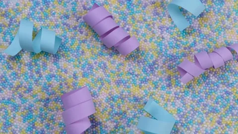 Festive multi-colored background in pastel delicate colors with sprinkles Stock Footage 228666841