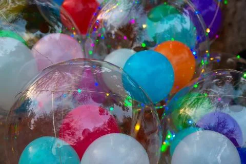Festive multi-colored glowing led balls Stock Photos