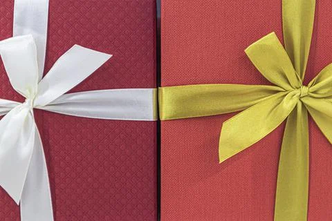 Festive multicolored boxes with ribbons large as background Stock-Fotos