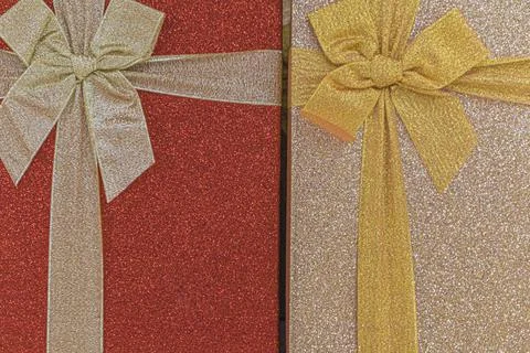 Festive multicolored boxes with ribbons large as background Foto stock