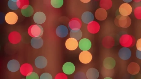 Festive multicolored flickering lights in the dark with a slow red beam. Stock Footage 144547670