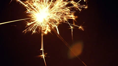 Festive new year sparkler Stock Footage 100820873