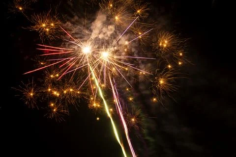 Festive nighttime pyrotechnic explosion Fotos de archivo
