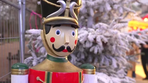 Festive Nutcracker Statue at Paris Christmas Market in Winter Scene Stock Footage 303780493