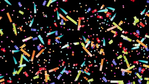 Festive paper pieces float in the air during a celebration event Видео 340970076