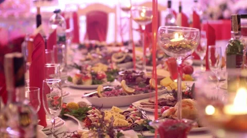 Festive party table with ornamentation decorations and many dishes and drinks Video stock 305594952