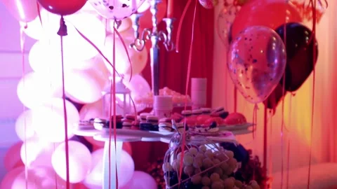 Festive party table with sweets and fruits and ornamentation decorations  Видео 305595064