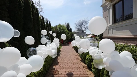 Festive path of white balloons Stock Footage 129918392
