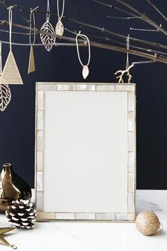 Festive photo frame on a table Stock Photos