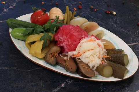 Festive Pickled Vegetable Medley on Patterned Plate, Delicious Appetizer Stock Photos