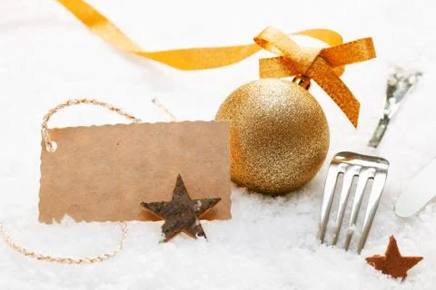 Festive place setting with gift tag Stock Photos