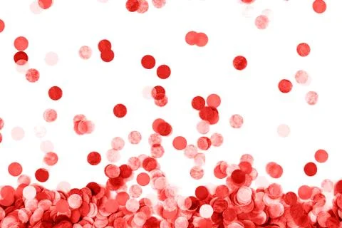 Festive red confetti background. Flat lay style. Stock Photos