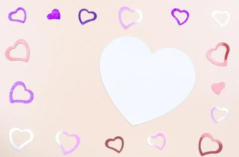 Festive romantic background of hearts of different colors Stock Photos