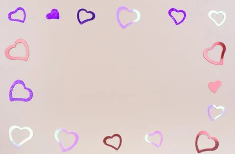 Festive romantic background of hearts of different colors Stock Photos