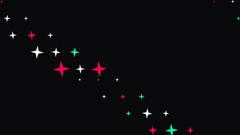 A festive scattering of vibrant red white and green stars on a black background Video stock 335117908