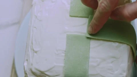 Festive serving arrangement of gift box cake decoration Stock Footage 342140612