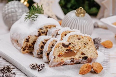 Festive Setting with Christmas Stollen Bread Stock Photos