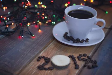 Festive still life with a coffee cup and 2018 inscription Stock Photos