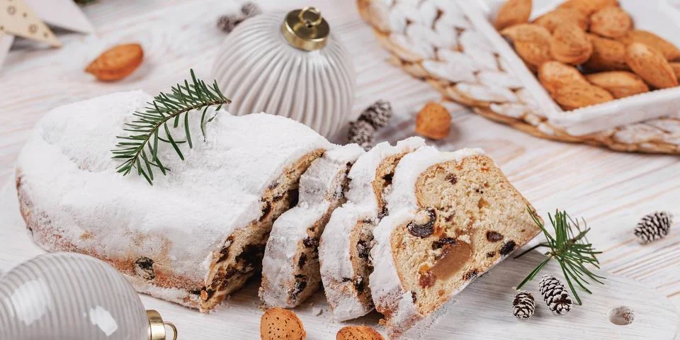 Festive Stollen Bread with Almonds and Decorations Stock Photos