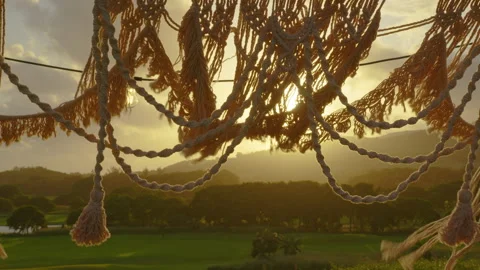 Festive string lights illumination on boho tipi arch decor on outdoor wedding Stock Footage 195167935