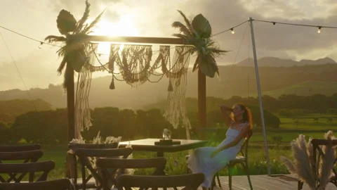 Festive string lights illumination on boho tipi arch decor on outdoor wedding Stock Footage 195292676