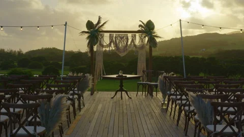 Festive string lights illumination on boho tipi arch decor on outdoor wedding Stock Footage 195947077