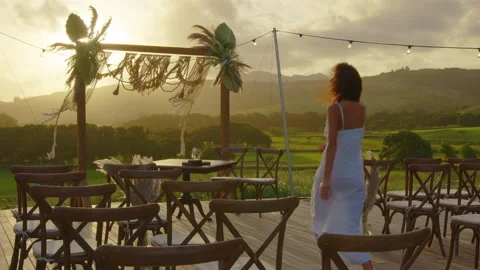 Festive string lights illumination on boho tipi arch decor on outdoor wedding Stock Footage 196066948