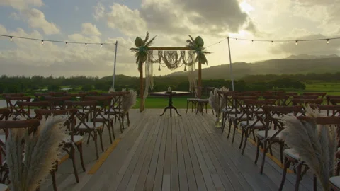 Festive string lights illumination on boho tipi arch decor on outdoor wedding Stock Footage 196936864