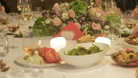 Festive table with appetizers and man hands  with food and drinks 스톡 동영상 96024213