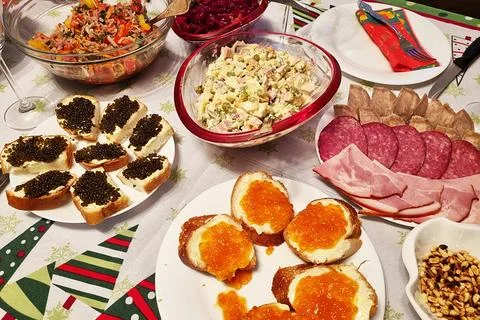 A festive table with appetizers, vegetables, and fruits. Holidays. Stock Photos