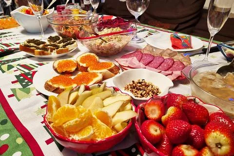 A festive table with appetizers, vegetables, and fruits. Holidays. Stock Photos