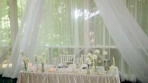 A festive table decorated and set for two people. Smooth camera movement Stock Footage 327380693