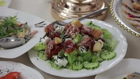 Festive table with delicious dishes. A large selection of dishes Stock Footage 231596174