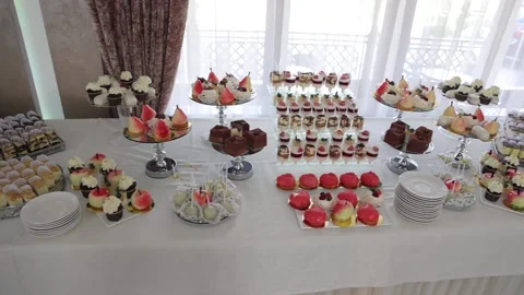 Festive table with delicious snacks. Great selection, whets the appetite Stock Footage 231596195