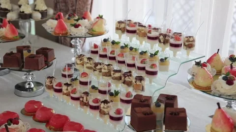 Festive table with delicious snacks. Great selection, whets the appetite Stock Footage 231596206