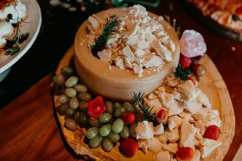 Festive table featuring an array of colorful treats and snacks arranged on a dec Stock Photos